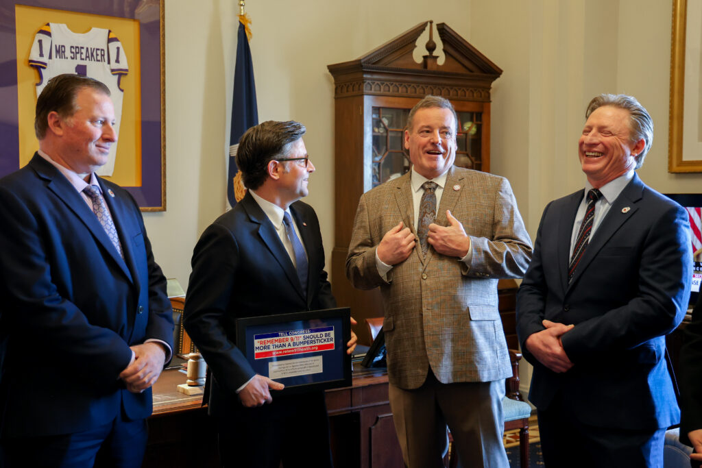 President of the Uniformed Firefighters Association Andrew Ansbro, Speaker Mike Johnson, President of Citizens for the Extension of the James Zadroga Act James Hart and President of the Uniformed Fire Officers Association James Borsi.
